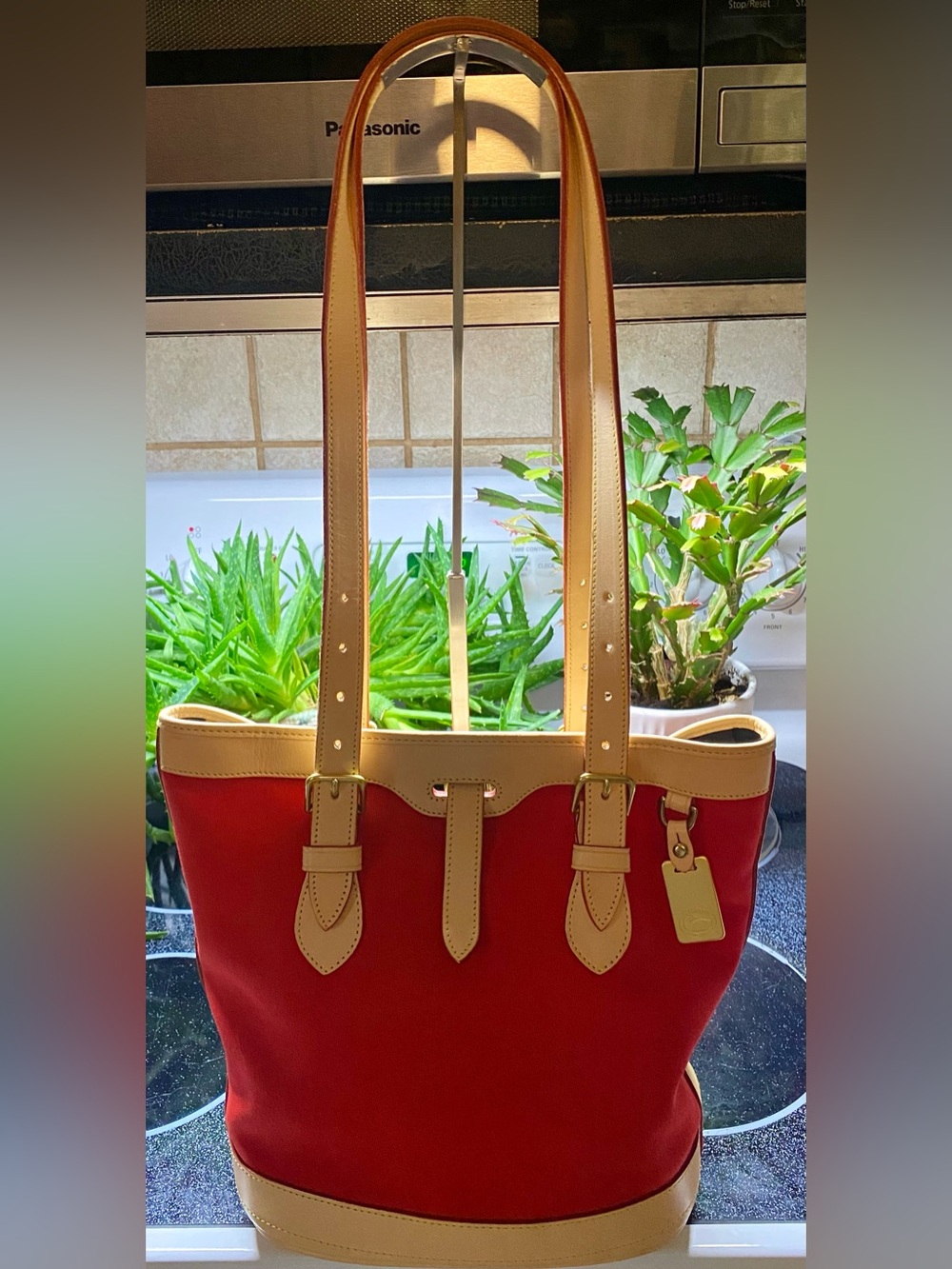 Dooney & Bourke Cabriolet Collection Bucket Tote Bag.